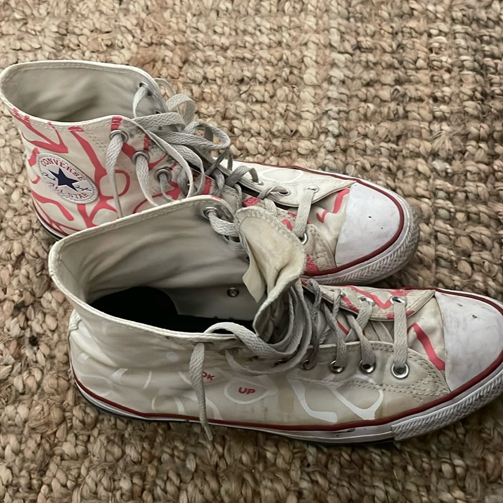 Pre-owned, worn and well used chuck taylors